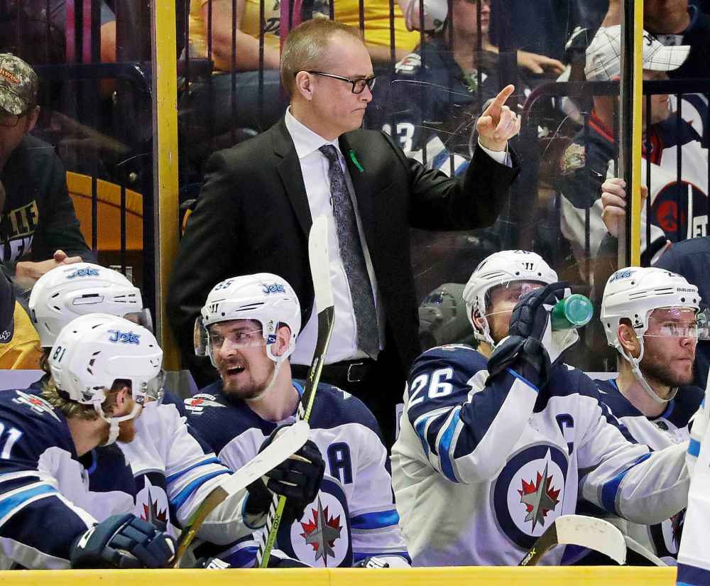Winnipeg Jets coach Paul Maurice gestures to his team during the third period in Game 5 of an NHL hockey second-round playoff series against the Nashville Predators, Saturday, May 5, 2018, in Nashville, Tenn. The Jets won 6-2 to take a 3-2 lead in the series. (AP Photo/Mark Humphrey)