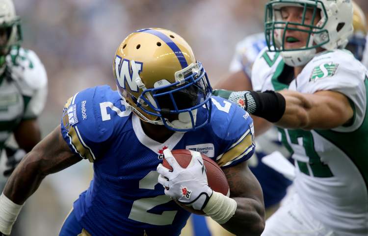 TREVOR HAGAN / WINNIPEG FREE PRESS
Bombers Jovon Johnson carries the ball during the first half of the Banjo Bowl.