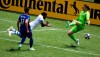 Montreal Impact forward Orji Okwonkwo (18) heads a ball past FC Cincinnati goalkeeper Spencer Richey (18) during an MLS soccer match, Saturday, May 11, 2019, in Cincinnati, Ohio. (Albert Cesare/The Cincinnati Enquirer via AP)