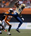 JONATHAN HAYWARD /  Canadian Press files
Bomber Cory Watson tries to get past B.C.'s J.R. Larose last year. Watson originally joined the Bombers in 2010, playing 67 games.