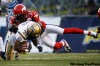 Jeff McIntosh / THE CANADIAN PRESS
Winnipeg Blue Bombers' Fred Reid (left) gets taken down by Calgary Stampeders' Dwight Anderson during first half CFL football action in Calgary on Saturday.