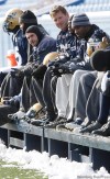JOE.BRYKSA@FREEPRESS.MB.CA
Winnipeg Blue Bombers Doug Brown, centre, and teammates keep their feet warm during practice Saturday morning at Canad Inns Stadium in Winnipeg - Winnipeg received it's first dump of snow and kept crews busy preparing the field for the team. The Bombers travelled to Hamilton Sunday for their game against the Hamilton Tiger-Cats on Monday.