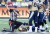 CP
Winnipeg Blue Bombers' Drew Willy, centre, grimaces in pain while an official calls for help from the sideline during the second half of CFL football action in Hamilton, Ont., on Sunday. (Peter Power / The Canadian Press)