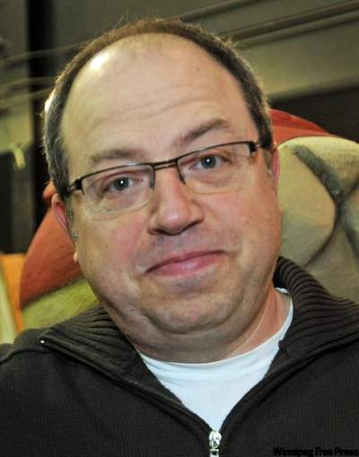 CP
Corner Gas star, creator and executive producer Brent Butt poses with some of the props  from the set of Corner Gas which were on display in Regina, Sask., on Friday, March 25, 2011. Butt was called in to replace Howie Mandel at the Winnipeg Comedy Festival.