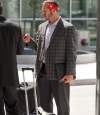 Melissa Tait / Winnipeg Free Press
Bombers quarterback Buck Pierce, who left Friday's game against the BC Lions with an apparent knee injury, arrived at the Winnipeg airport from Vancouver Saturday afternoon with a limp, but wasn't using a cane. Pierce said he was 
