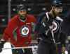 JOE BRYKSA / WINNIPEG FREE PRESS
Dustin Byfuglien, left, and Captain Andrew Ladd at practice this morning.