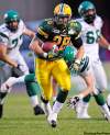 JIMMY JEONG / THE CANADIAN PRESS ARCHIVES
Jesse Lumsden, while playing with Edmonton, runs the ball against the Saskatchewan Roughriders in a game on  June 17, 2009.