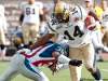 PAUL CHIASSON / THE CANADIAN PRESS
Winnipeg Blue Bombers receiver Terence Jeffers-Harris (14) tries to fend off Alouettes tackler Jerald Brown Sunday in Montreal.