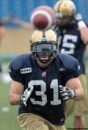 JOE.BRYKSA@FREEPRESS.MB.CA
Ian Logan eyes the ball on his return to turf at Canad Inns Stadium Tuesday.