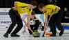 Mark O'Neill / The Canadian Press
Manitoba skip Braden Calvert throws a rock during the men's final at the M&M Meat Shops Junior Curling championship in Liverpool, N.S. Sweeping for him are lead Brendan Wilson and second Lucas Van Den Bosch. Manitoba won the match.