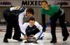 PHIL.HOSSACK@FREEPRESS.MB.CA
PEI Skip Robert Campbell pushes his rock against Quebec Monday afternoon in Morris at the 