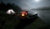 Bruce Bumstead / Brandon Sun
Matt Goerzens keeps warm by the campfire along the Assiniboine River canoe route near Spruce Woods Provincial Park following an evening of star gazing at the Spirit Sands.