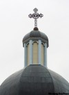 One way to easily distinguish the two types of churches is by their crosses. The Ukrainian Catholic cross atop its domes is just the regular pole stake and one cross piece.