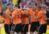 Ivan Sekretarev/ The Associated Press
Netherlands' Dirk Kuyt, second from right, celebrates with teammates including Netherlands' John Heitinga, right, after scoring today during the World Cup group E soccer match between the Netherlands and Denmark. The Netherlands won 2-0.