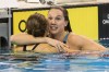 Chantal Vanlandeghem, right, is congratulated by Sandrine Mainville after winning the women's 50m freestyle event during the finals of the Canadian Olympic swimming trials in Toronto on Sunday, April 10, 2016. Vanlandeghem, of Winnipeg, is among 26 swimmers going to the 2016 Olympic Games in Rio de Janeiro to represent Canada. THE CANADIAN PRESS/Chris Young