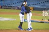 Toronto Blue Jays pitcher Marcus Stroman (right) greets shortstop Freddy Galvis during an on-field session in Toronto on Wednesday, March 27, 2019, ahead of tomorrow's season opening game.THE CANADIAN PRESS/Chris Young