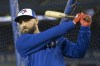 Toronto Blue Jays' Kevin Pillar takes a practice swing before stepping into the batting cage during a practice in Toronto on Wednesday, March 27, 2019, ahead of tomorrow's season opening game. The Jays have traded centre-fielder Pillar to the San Francisco Giants for right-handed pitchers Juan De Paula and Derek Law and infielder Alen Hanson.THE CANADIAN PRESS/Chris Young