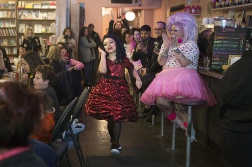 Queen Lactatia performs at Toronto's Glad Books on Saturday, April 27, 2019. An over-the-top foursome who recently took over a bookstore/restaurant in Toronto's gay village are the stars of the Canadian documentary film, 