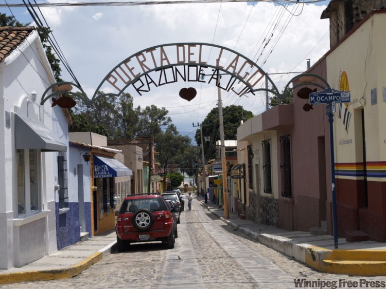 Canwest News Service
Puerta del Lago arch in downtown Ajijic, Mexico, with the lake in the background.
