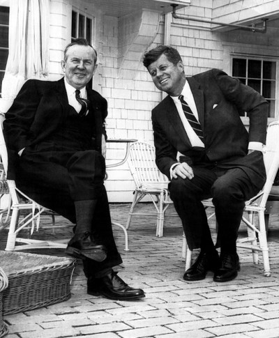 Canadian Prime Minister Lester Pearson warms his hands in his pockets as he chats with President John Kennedy for benefit of photographers on terrace of President's summer home at Hyannis Port on Cape Cod, May 10, 1963. THE CANADIAN PRESS/AP, files