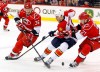 Florida Panthers' Shawn Matthias (18) moves between Carolina Hurricanes' Jussi Jokinen (36), of Finland, and Drayson Bowman (21) during the first period of an NHL hockey game, Tuesday, March 19, 2013, in Raleigh, N.C. The Pittsburgh Penguins have acquired Jokinen from the Carolina Hurricanes for a conditional sixth- or seventh-round pick in this year's NHL Entry Draft. THE CANADIAN PRESS/AP-Karl B DeBlaker