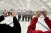 DAVID LIPNOWSKI / WINNIPEG FREE PRESS 
From left, coach Tom Clasper, skip Alex Forrest, third Joey Witherspoon, second Connor Njegovan and lead Mike Neufeld have their picture taken while waiting for the Manitoba Championship trophy to be presented to them after winning the championship final of junior men’s curling provincials at the Deer Lodge Curling Club Tuesday.
