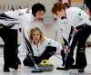 WAYNE.GLOWACKI@FREEPRESS.MB.CA 
Jennifer Jones watches her rock along with teammates (left) Jill Officer and Dawn Askin against Team Streich at the start of the $60,000 2010 Manitoba Lotteries Women's Curling Classic held at the Fort Rouge Curling Club.