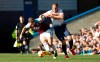 Tottenham Hotspur's Harry Kane, right, and Burnley's James Tarkowski during their English Premier League soccer match at Turf Moor in Burnley, England, Saturday Feb. 23, 2019. (Martin Rickett/PA via AP)