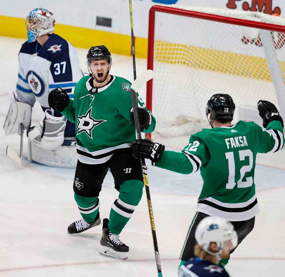 CP
LM OTERO / THE ASSOCIATED PRESS
Dallas Stars left wing Blake Comeau (15) celebrates with teammate Radek Faksa (12) after scoring a goal against Winnipeg Jets goaltender Connor Hellebuyck (37) during the second period of an NHL hockey game in Dallas, Saturday, Jan. 19, 2019.