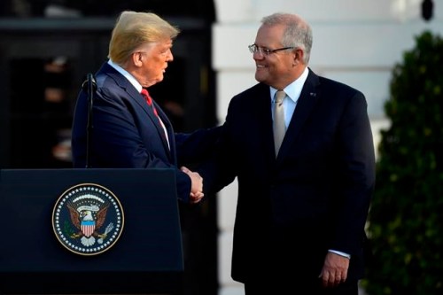 President Donald Trump shakes hands with Australian Prime Minister Scott Morrison during a State Arrival Ceremony on the South Lawn of the White House in Washington, Friday, Sept. 20, 2019. (AP Photo/Susan Walsh)