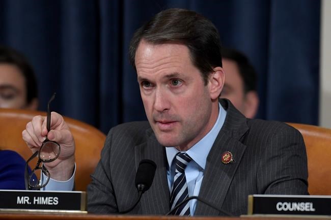 Rep. Jim Himes, D-Conn., questions top U.S. diplomat in Ukraine William Taylor, and career Foreign Service officer George Kent, at the House Intelligence Committee hearing on Capitol Hill in Washington, Wednesday, Nov. 13, 2019, during the first public impeachment hearing of President Donald Trump's efforts to tie U.S. aid for Ukraine to investigations of his political opponents. (AP Photo/Susan Walsh)