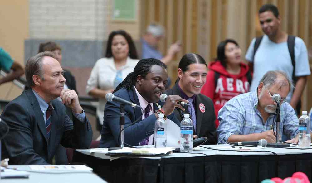 Jason Halstead / Winnipeg Free Press
Federal election candidates (from left) Pat Martin (New Democratic Party), Don Woodstock (Green Party), Robert-Falcon Ouellette (Liberal Party) and Darrell Rankin (Communist Party) discuss their platforms on key downtown issues at a forum hosted by the Downtown Winnipeg BIZ at Portage Place Shopping Centre on Sept. 16, 2015.
