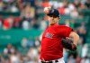 FILE - In this Friday, June 22, 2018 file photo, Boston Red Sox starting pitcher Steven Wright delivers to the Seattle Mariners during the first inning of a baseball game at Fenway Park in Boston. Boston Red Sox pitcher Steven Wright has been suspended for 80 games following a positive test for Human Growth Hormone. Major League Baseball made the announcement Wednesday, March 6, 2019 the latest in a series of setbacks for the 34-year-old knuckleball pitcher. (AP Photo/Elise Amendola, File)