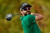 Adam Hadwin watches his tee shot on the fifth hole during the final round of the Desert Classic golf tournament on the Stadium Course at PGA West on Sunday, Jan. 20, 2019, in La Quinta, Calif. (AP Photo/Chris Carlson)
