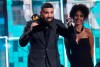 Drake accepts the award for best rap song for 