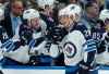 JEFF ROBERSON / THE ASSOCIATED PRESS
Winnipeg Jets' Patrik Laine (29), of Finland, is congratulated by Brendan Lemieux after scoring during the second period of an NHL hockey game against the St. Louis Blues, Saturday, Nov. 24, 2018, in St. Louis.