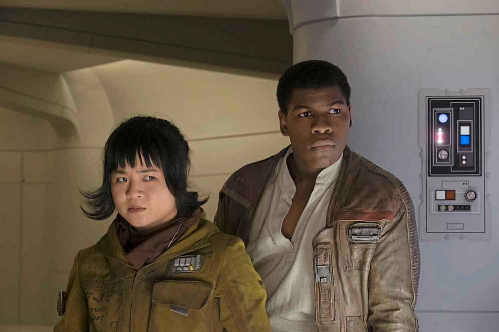 Both Kelly Marie Tran (left) and John Boyega were attacked by online trolls simply for being in the new Star Wars movies. (David James / Lucasfilm)
