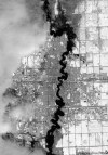 DigitalGlobe / The Associated Press
This black and white satellite image taken Sunday March 29 shows the Red River and areas of flooding in Fargo, N.D.