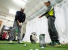 Carson Hau (right), Director of Technology at The Golf Lab, and student Matthew Parkinson practice during a training session at The Golf Lab in King City, Ontario on Saturday May 4, 2019. THE CANADIAN PRESS/Frank Gunn