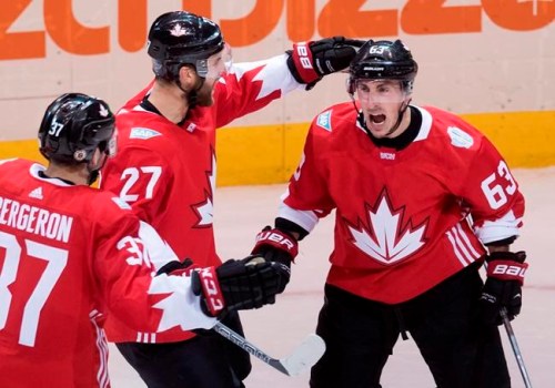 Team Canada's Brad Marchand (63) celebrates his game-tying goal on Russia with teammates Alex Pietrangelo (27) and Patrice Bergeron (37) during second period semifinal World Cup of Hockey action in Toronto on Saturday, September 24, 2016. THE CANADIAN PRESS/Frank Gunn