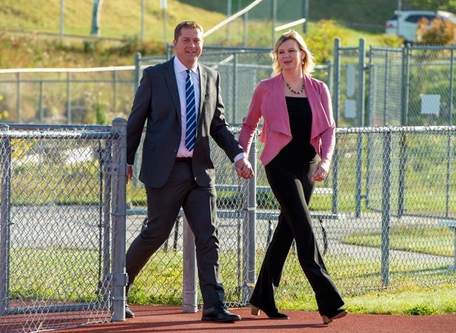 Federal Conservative leader Andrew Scheer and his wife Jill arrive to make a campaign announcement in Saint John, N.B. on Friday September 20, 2019. THE CANADIAN PRESS/Frank Gunn