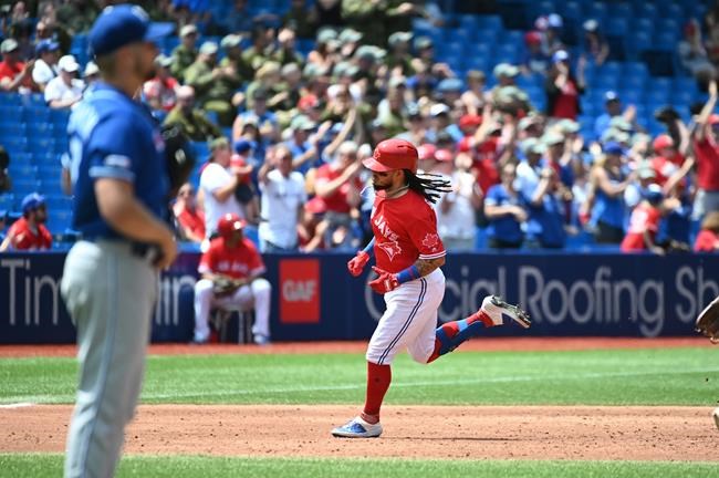 Toronto Blue Jays' Freddy Galvis rounds the bases after hitting a solo home run off Kansas City Royals' Glenn Sparkman during third inning MLB baseball action in Toronto on Monday, July 1, 2019. THE CANADIAN PRESS/Jon Blacker