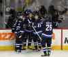 Phil Hossack / Winnipeg Free Press
Jets' Blake Wheeler skates in to congratulate teammate Evander Kane for scoring the tying goal against the Boston Bruins Thursday at the MTS centre.