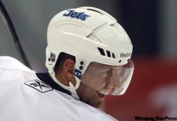 KEN GIGLIOTTI  / WINNIPEG FREE PRESS
Winnipeg Jet Eric Fehr, recovering from a shoulder injury and surgery, takes part in a light skate at the Ice Plex Wednesday.