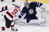 John Woods / The Canadian Press
Winnipeg Jets goaltender Ondrej Pavelec saves the shot from New Jersey Devils' Bobby Butler during the first-period.