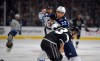 Mark J. Terrill / The Associated Press
Jets right wing Chris Thorburn scraps with Kings left wing Kyle Clifford.
