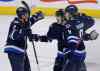 John Woods / The Canadian Press
Evander Kane (left), Mark Scheifele (centre) and Jacob Trouba celebrate Trouba's goal against the Florida Panthers during the first period of Friday's 5-2 win.