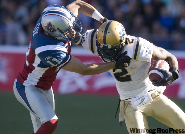 JOHN KENNEY / CANWEST NEWS SERVICE ARCHIVES
Winnipeg’s Jovon Johnson (right) has become a dynamo as a kick returner while also developing into a shutdown corner in 2009.
