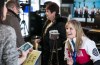 Melissa Tait / Winnipeg Free Press
Jennifer Jones, 2014 Olympic curling gold medal winner, laughs with fans as she signs autographs at the Winnipeg Free Press News Café Tuesday afternoon. The Jones rink will drop the puck at the Winnipeg Jets game Tuesday night at MTS Centre.