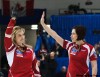 Nathan Denette / the canadian press
Canadian skip Jennifer Jones, left, and second Jill Officer wave to the crowd after defeating Sweden for the bronze medal during the 2010 World Women's Curling Championships in Swift Current, Sask., on Sunday. Canada won 9-6.